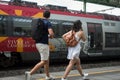 Portrait of couple of tourists walking in the train station