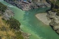 Bhagirathi river from left side and Alakananda river with turquoise blue colour from right side converge at Devprayag,Holy Royalty Free Stock Photo
