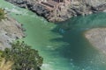 Bhagirathi river from left side and Alakananda river with turquoise blue colour from right side converge at Devprayag,Holy Royalty Free Stock Photo