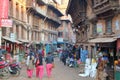 BHAKTAPUR, NEPAL - DECEMBER 31, 2014: Busy commercial street with traditional house facades