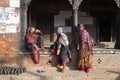 Nepalese women chat together at Durbar Square in Bhaktapur