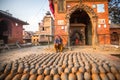 BHAKTAPUR, NEPAL - Nepalese man working in his pottery workshop. Royalty Free Stock Photo