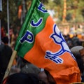 Bharatiya Janata Party Flag of Indian political party, BJP Bhartiya Janta Party Flag Waving during PM road show in Delhi, India