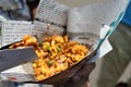 Epitome of street food in India. Snacks rolled up in newspaper cones Royalty Free Stock Photo