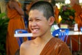 Buddhist young monk in Thailand smiling