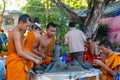 Buddhist young monks in Thailand temple wat doing handcrafts