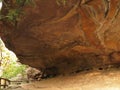 Bhimbetka rock shelter with petroglyphs of herd of animals on cave ceiling, Madhya Pradesh, India Royalty Free Stock Photo