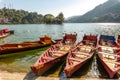 Scenic Bhimtal lake with wooden tourist boats at at Nainital Uttarakhand India.