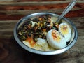Bhindi fry curry over mini rice bowl Royalty Free Stock Photo