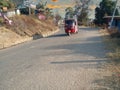 Bhojpur Nepal , 12 Janaury , 2023 , View from the Outside of an auto-rickshaw, TukTuk taxi running for passenger service on the