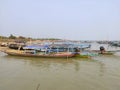 Small wooden fishing boats anchored near the shore. Royalty Free Stock Photo