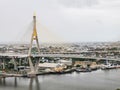 Bhumibol Bridge with river, cityscape view and cloudy sky in the morning Royalty Free Stock Photo