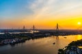 Bhumibol suspension bridge over Chao Phraya River at sunset in Bangkok city, Thailand Royalty Free Stock Photo