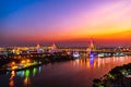 Bhumibol suspension bridge over Chao Phraya River at sunset in Bangkok city, Thailand Royalty Free Stock Photo