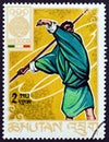 BHUTAN - CIRCA 1968: A stamp printed in Bhutan from the `Olympic Games, Mexico` issue shows javelin throw, circa 1968.