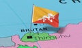 Bhutan, Timphu - national flag pinned on political map Royalty Free Stock Photo