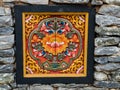 Bhutan traditional wooden decoration in rock wall