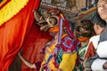 Bhutanese Cham masked dance, Buddhist lama dance, dancers behind the curtain and waiting for the play , Bumthang, central Bhutan. Royalty Free Stock Photo