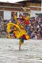 Bhutanese Cham masked dance, Ox mask dancer leap into the air