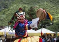 Snow Lion head deity playing drum , Bhutanese Cham Mask dance , Bhutan