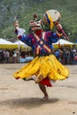 Snow Lion head deity dancing , Bhutanese Cham Mask dance , Bhutan