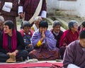 A Bhutanese lady put her palms together and praying , Bumthang , central Bhutan