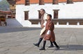 Bhutanese man and child in traditional clothing, Thimphu, Bhutan