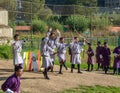 Bhutanese men competes in a game of archery - Timphu, Bhutan. Royalty Free Stock Photo