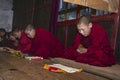 Bhutanese novice monks learn the Buddhism text in early morning , Bhutan