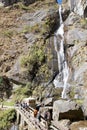 Bhutanese people and tourist along the path to the Tiger's Nest, Paro, Bhutan