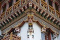 Bhutanese wooden carving cornice of monastery , snow lions , Bhutan