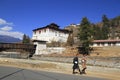 Bhutanese young man in traditional clothes walk on the street