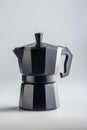 Bialetti moka pot. Coffee maker on gray background Royalty Free Stock Photo