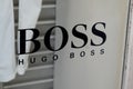 Hugo Boss brand logo shop and text facade sign store entrance German luxury fashion