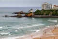 Biarritz, France. View of the beach with surfers, coastline and iconic landmarks. Royalty Free Stock Photo
