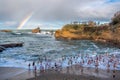 Crowd of swimmers entering the water for the traditional Christmas swim, Biarritz, France