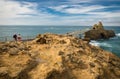 Biarritz, France - October 4, 2017: tourists people walking on bridge, visiting wonderful place of rocher de la vierge Royalty Free Stock Photo