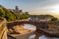 Biarritz, France. Panoramic view of the famous stone bridge to the Rocher du Basta, cityscape and coastline. Royalty Free Stock Photo