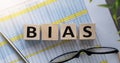 BIAS - text on wooden cubes, on White background