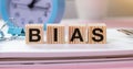 BIAS - text on wooden cubes, on White background