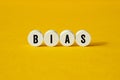 Bias - word concept on building blocks, text