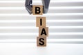 Bias - word from wooden blocks with letters