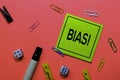 Bias! write on sticky notes isolated on Pink background