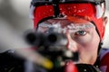 biathlete aligning sights, frost on eyebrows, anticipation palpable