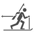 Biathlete at distance solid icon, Winter sport concept, biathlon sportsman sign on white background, Biathlete skiing