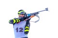  biathlete in standing position with rifle