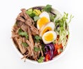 Pulled pork loaded ramen bowl dish