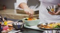 Bibimbap, Traditional Korean cuisine bibimbap, Chef preparing Korean food, chef cooking in kitchen Royalty Free Stock Photo