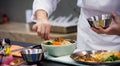 Bibimbap, Traditional Korean cuisine bibimbap, Chef preparing Korean food, chef cooking in kitchen Royalty Free Stock Photo