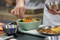 Bibimbap, Traditional Korean cuisine bibimbap, Chef preparing Korean food, chef cooking in kitchen Royalty Free Stock Photo